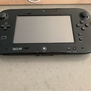WiiU console and pad with accessories